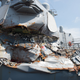 The starboard side of USS Fitzgerald showing the damage to the CO’s stateroom which took a direct hit. Image: US Navy
